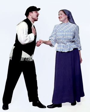 Shawn Smith Jones is Motel the Tailor and Marie Schmidt is Tzeitel Photo