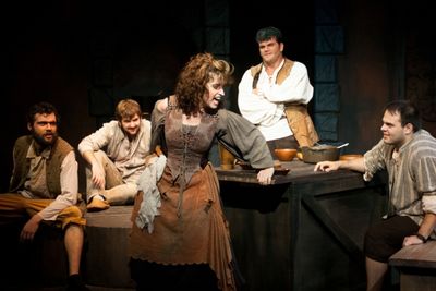 Boni Hester (Center) as Aldonza and (from left) Stephen Mercantel, Paul Koudouris, Br Photo