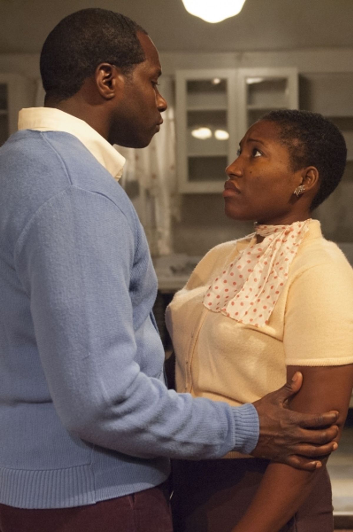 Joseph Asagai (Daryl Satcher, left) gives Beneatha Younger (Mildred Marie Langford) many new things to think about. at 