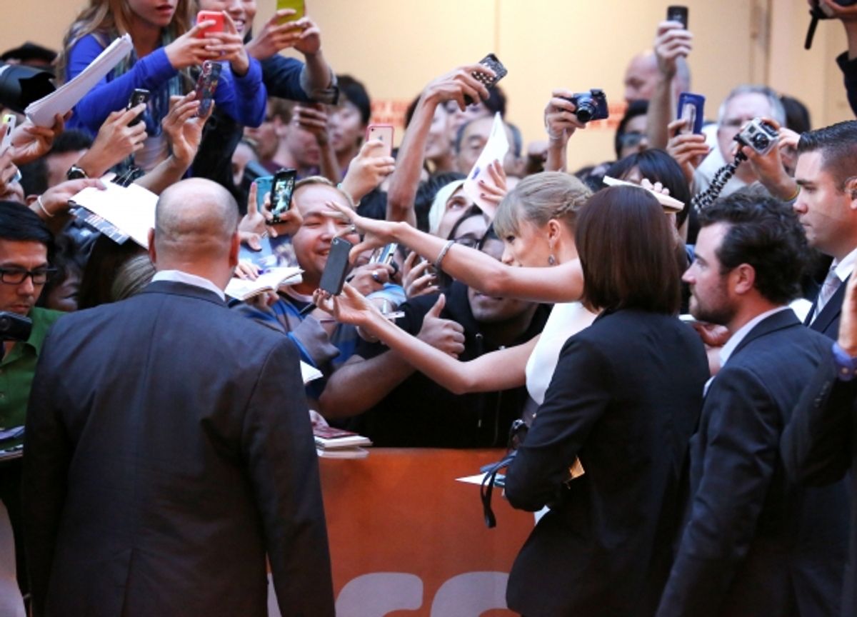 Taylor Swift with fans  at 