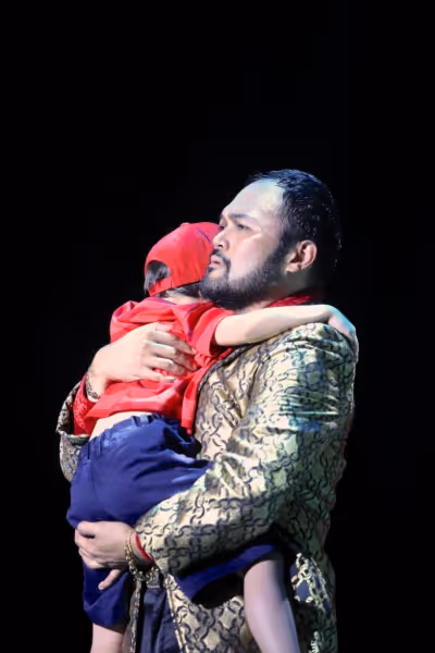 Tam (Daphne Valenti) with the Engineer (Orville Mendoza) Photo