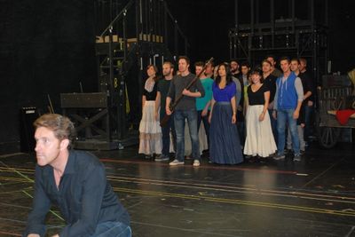 Earl Carpenter and The Company of Les Miserables. Photo