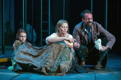 Rossignol (Mark L. Montgomery) shares his apricots with Beatriz (ensemble member Joan Photo