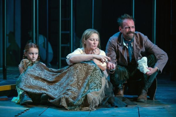 Rossignol (Mark L. Montgomery) shares his apricots with Beatriz (ensemble member Joan Photo