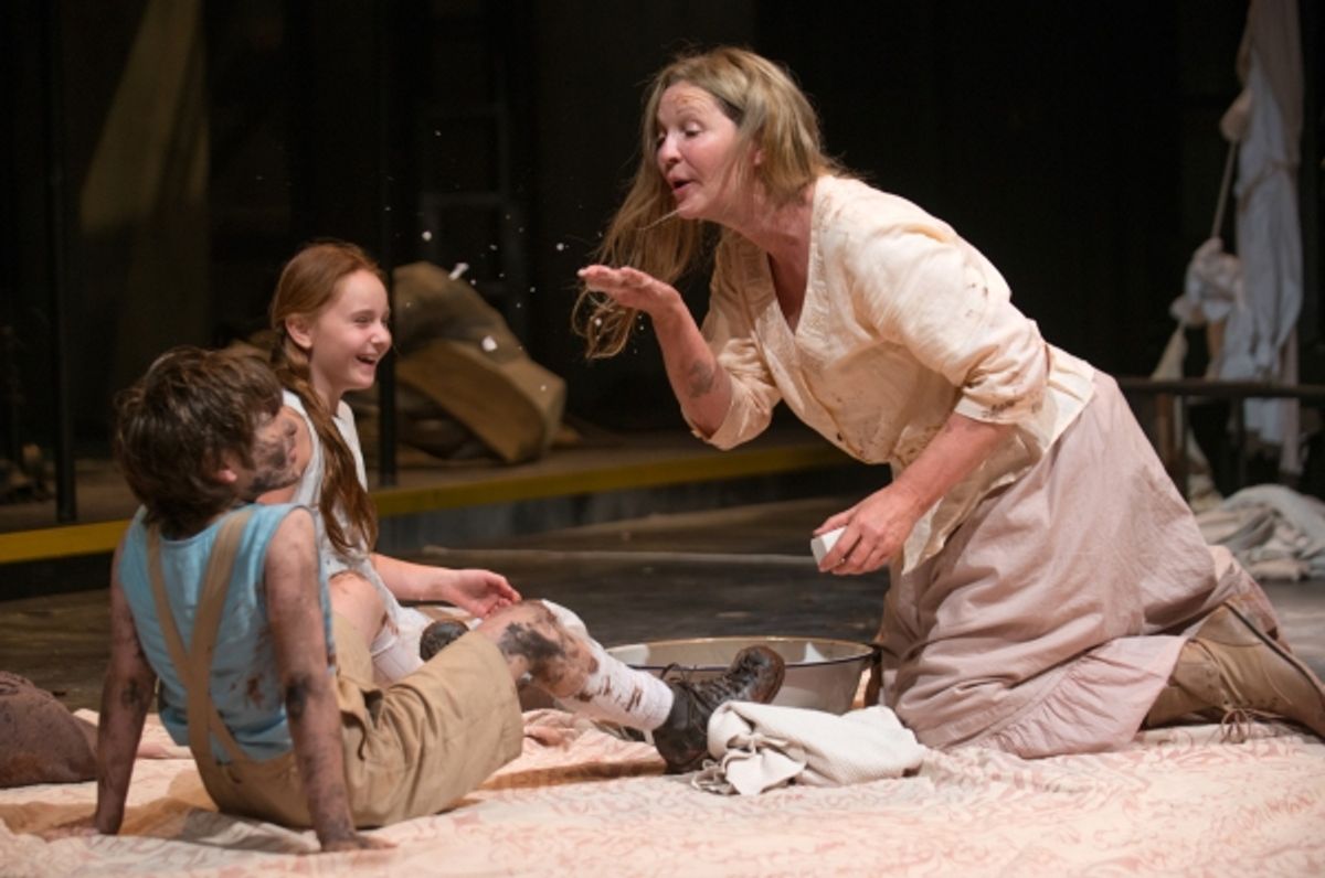 Beatriz (ensemble member Joan Allen) shares the soap she just purchased with The Girl (Emma Gordon) and The Boy (Daniel Pass) at 