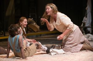 Beatriz (ensemble member Joan Allen) shares the soap she just purchased with The Girl Photo