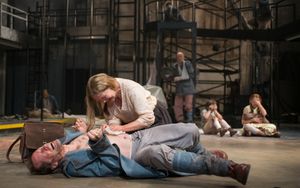 Beatriz (ensemble member Joan Allen, center) attempts to remove a bullet from a soldier (ensemble member Tim Hopper) @ BroadwayWorld Beatriz (ensemble member Joan Allen, center) attempts to remove a bullet from a soldi Photo