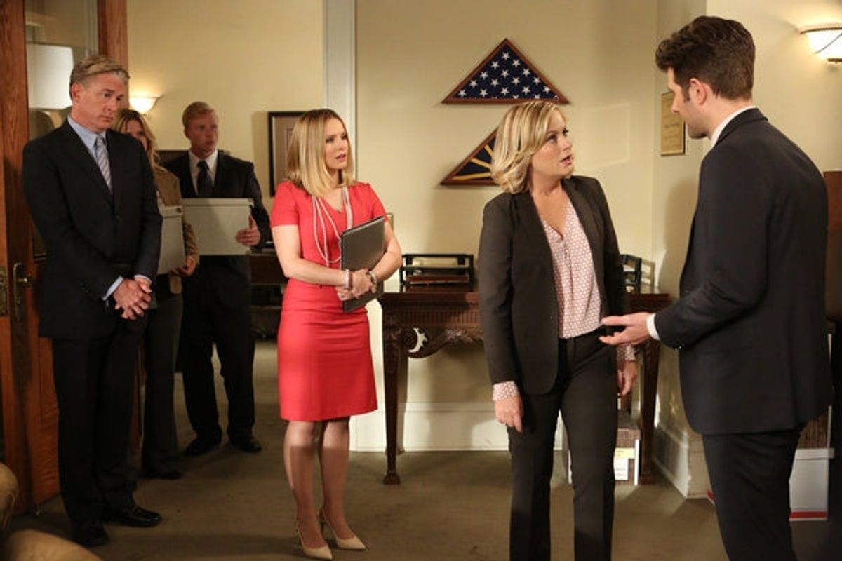 PARKS AND RECREATION -- ''The Pawnee-Eagleton Tip Off Classic'' Episode 603 -- Pictured: (l-r) Kristen Bell as Ingrid de Forest, Amy Poehler as Leslie Knope, Adam Scott as Ben Wyatt -- (Photo by: Danny Feld/NBC) at 