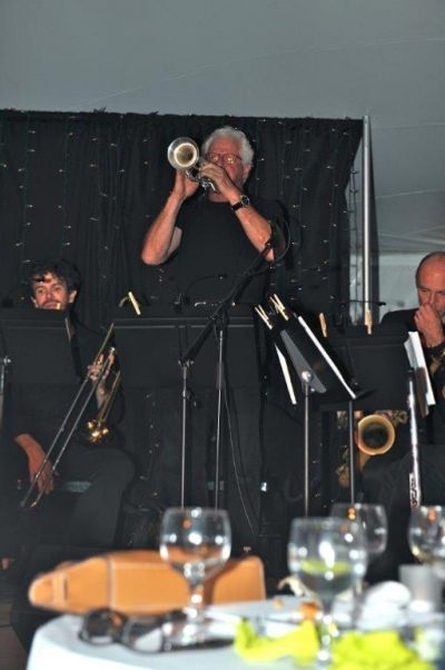 Arranger and Trumpet player Jim Hynes plays a solo of a recently discovered Johnny Me Photo