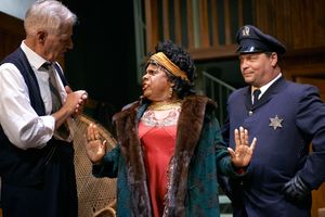 Ma Rainey (Tina Fabrique*) sets the record straight for her manager, Sturdyvant (Tom Bloom*) as police officer (Corey Gagne) looks on @ BroadwayWorld Ma Rainey (Tina Fabrique*) sets the record straight for her manager, Sturdyvant (Tom Photo
