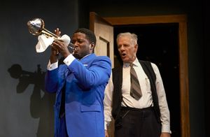 Levee (Warner Miller*) soulfully plays his trumpet just as Irvin (Tom Bloom*) interrupts the band’s rehearsal @ BroadwayWorld Levee (Warner Miller*) soulfully plays his trumpet just as Irvin (Tom Bloom*) interru Photo