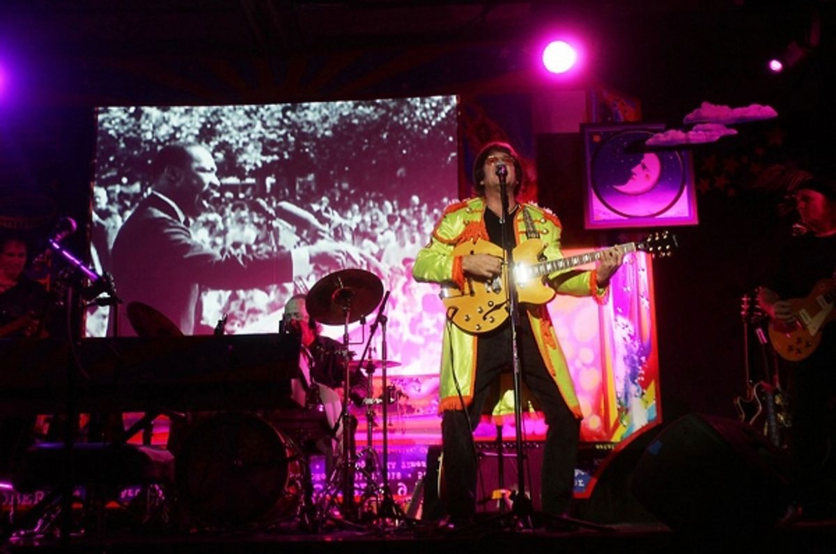 Tim Piper as John Lennon at 