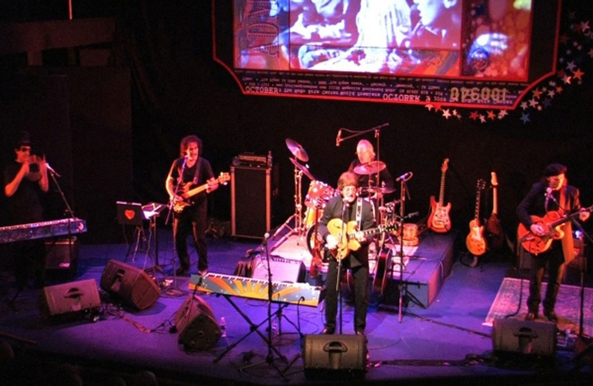 Tim Piper as John Lennon at 