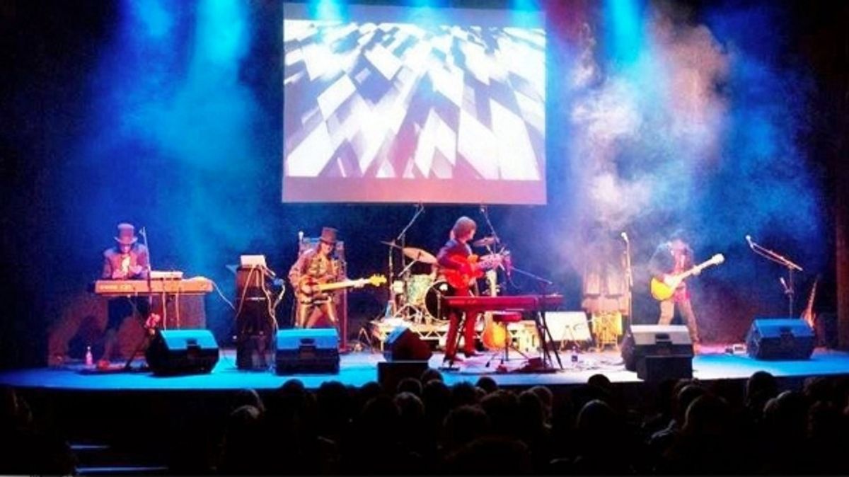 Tim Piper as John Lennon and Company at 