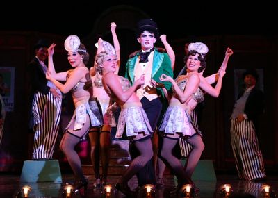 Drew Tandal as the Master of Ceremonies in the musical number ''The Money Song'' Photo