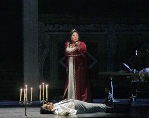 Kara Shay Thomson as Floria Tosca, after she has killed the ruthless Baron Scarpia (L Photo