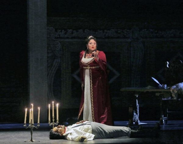 Kara Shay Thomson as Floria Tosca, after she has killed the ruthless Baron Scarpia (L Photo