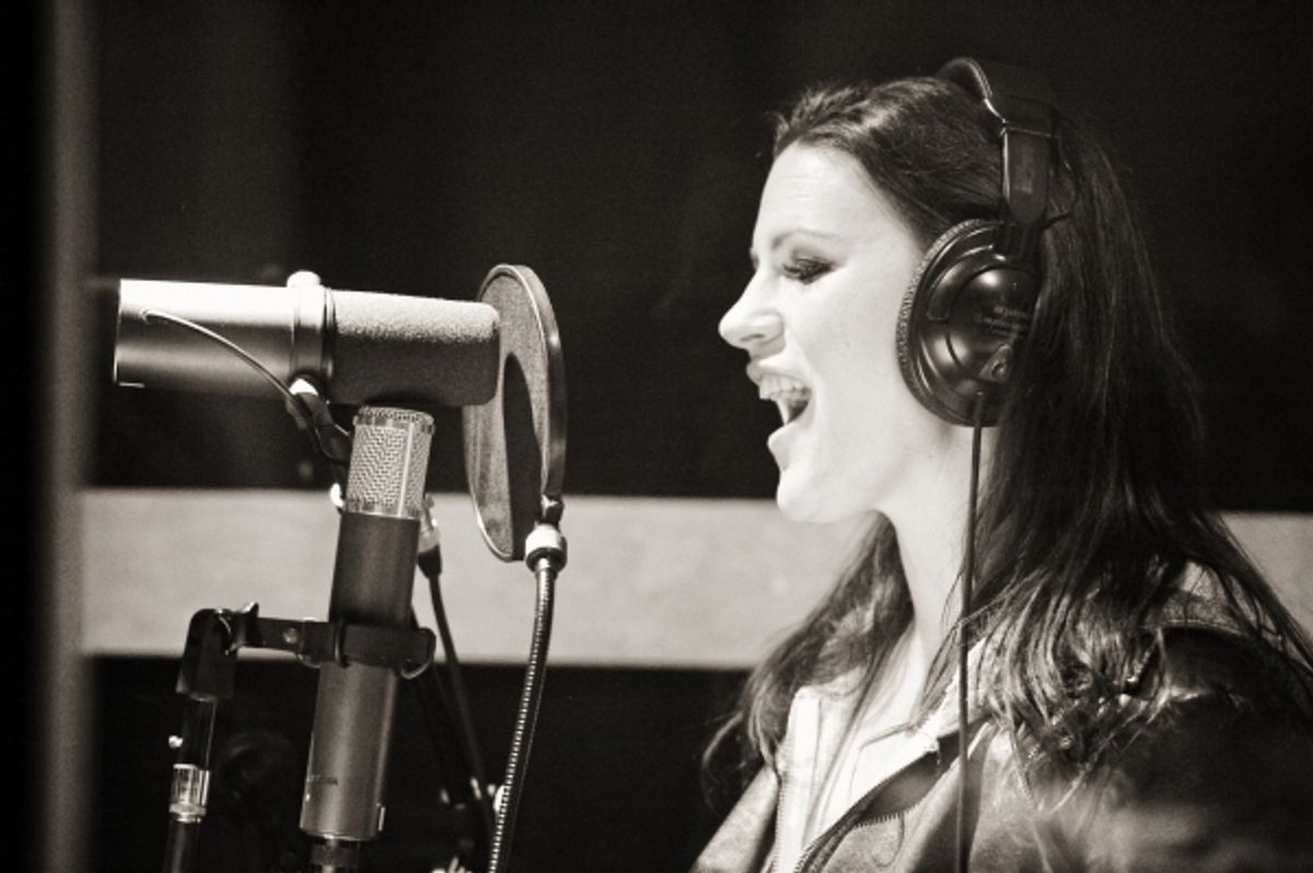 Carrie Manolakos. at 