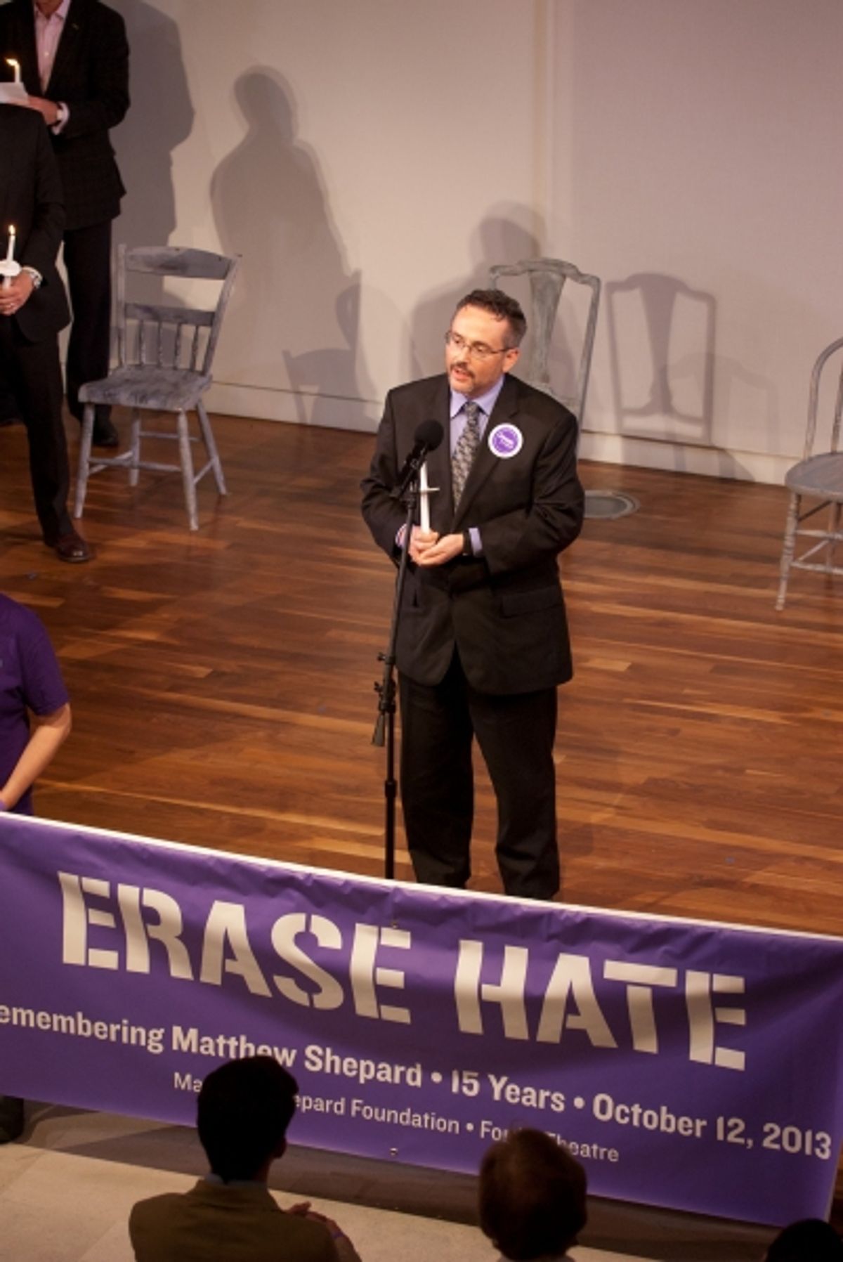 Rev. Dwayne Johnson leads an interfaith moment of silence. at 