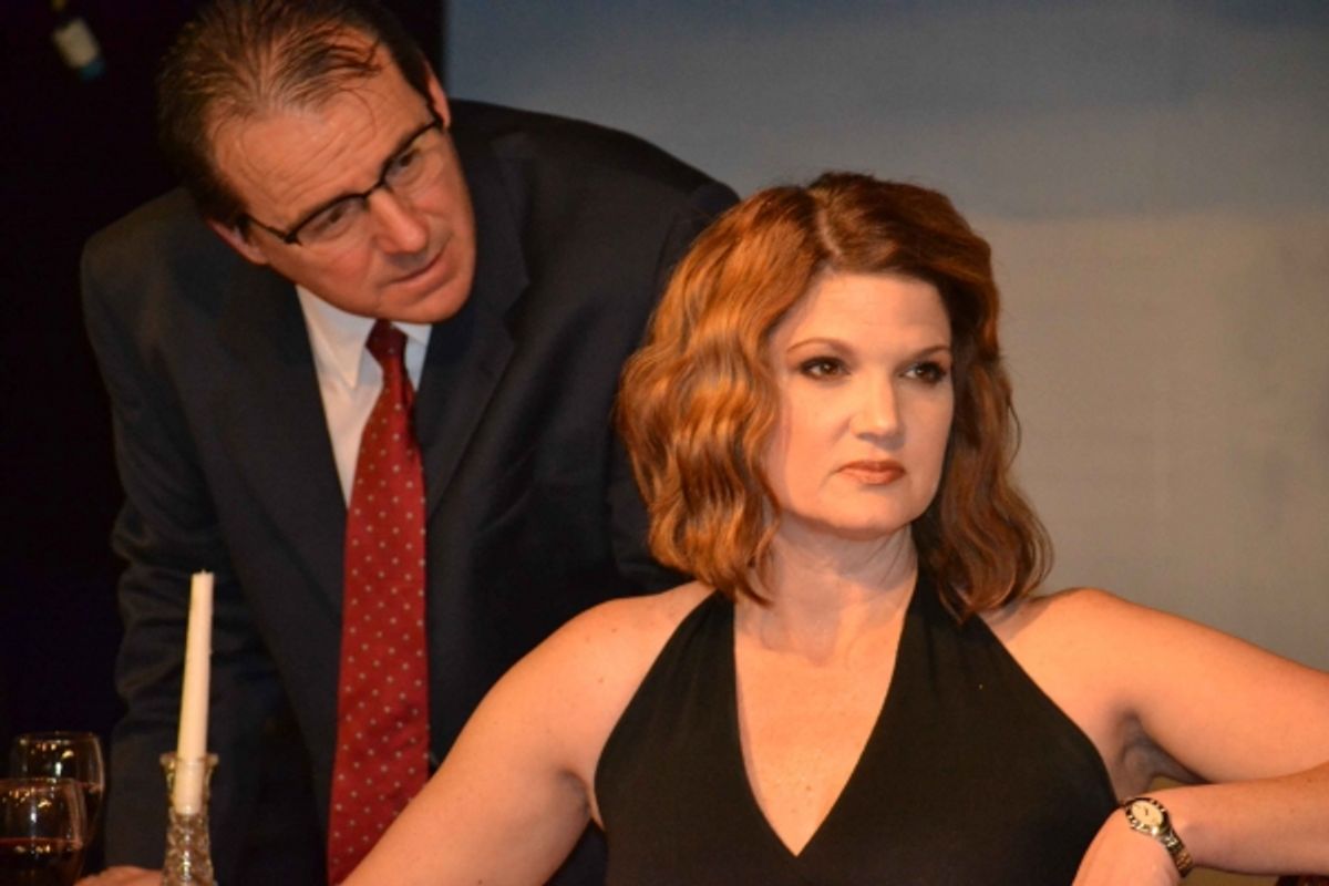 Gerardo (Kevin Daugherty) tries to explain to Paulina (Malinda L. Beckham) why he is late for supper. at 