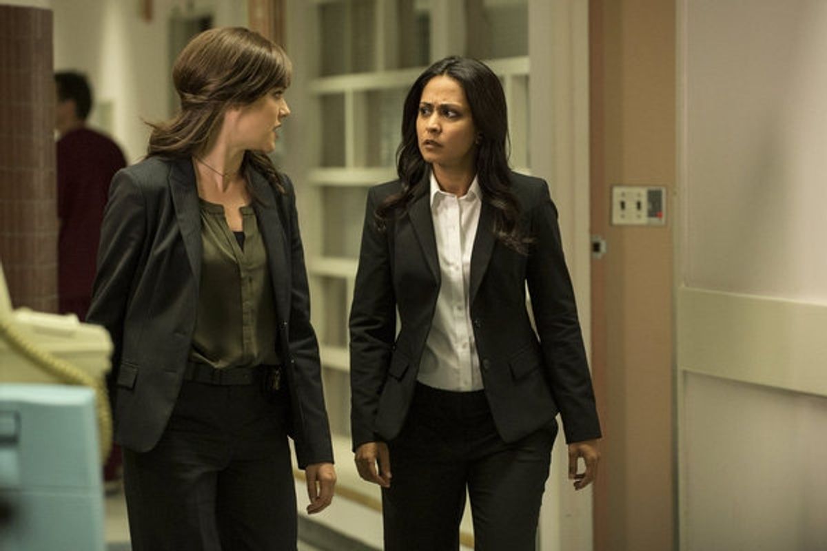 THE BLACKLIST -- ''Frederick Barnes'' Episode 106 -- Pictured: (l-r) Megan Boone as Elizabeth Keen, Parminder Nagra as Meera Malick -- (Photo by: David Giesbrecht/NBC) at 