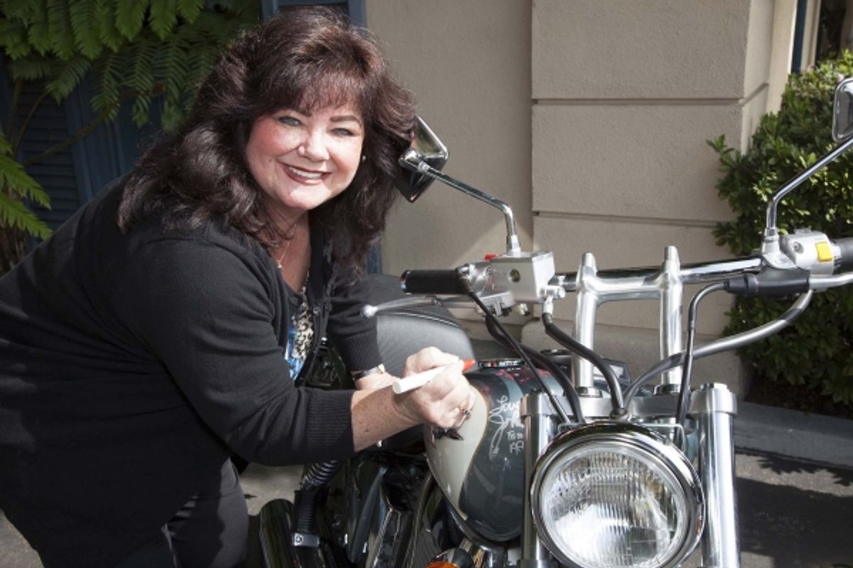 Tammy Locke (The Monroes) signs bike at 