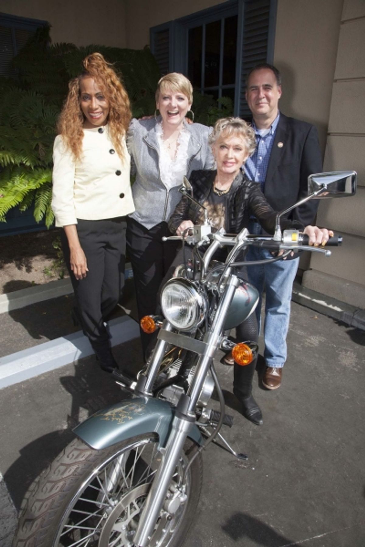 Sandra Lord, Alison Arngrim, Tippi Hedren and Grier Weeks pose with bike at 