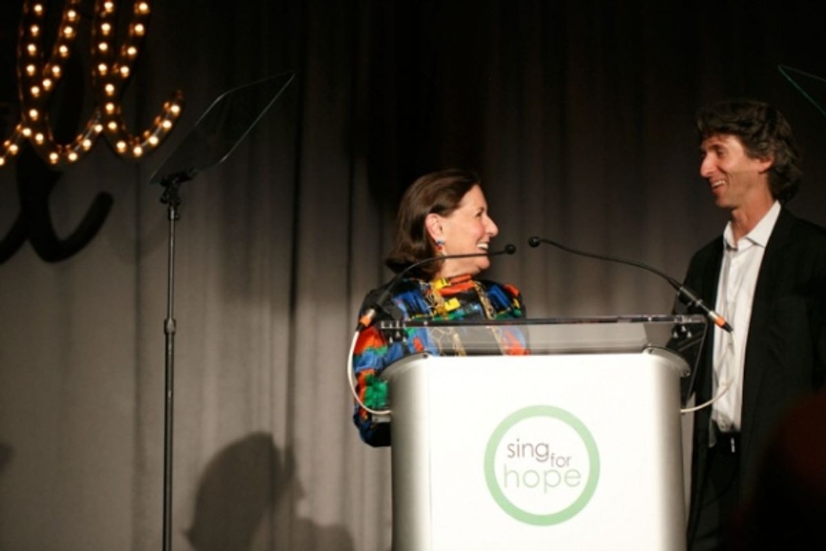 Sing for Hope Gala Chair, Board Member, and Founders'' Circle Member Ann Ziff welcomes fellow Board Member and international ballet icon Damian Woetzel to the stage at 