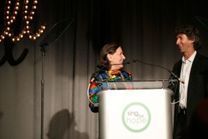 Sing for Hope Gala Chair, Board Member, and Founders'' Circle Member Ann Ziff welcomes fellow Board Member and international ballet icon Damian Woetzel to the stage @ BroadwayWorld Sing for Hope Gala Chair, Board Member, and Founders'' Circle Member Ann Ziff welcome Photo