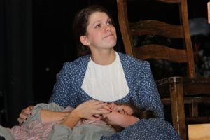 Kate Keller (Cara Bachman, double cast) cradles Helen (Katelyn Sparks, double cast),  Photo