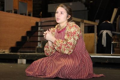 Emmy Brien is double cast as Helen Keller, a girl trapped in her own silent world and Photo