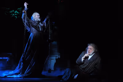 The Ghost of Jacob Marley (actor Lynn Robert Berg) warns Ebenezer Scrooge (actor Aled Photo