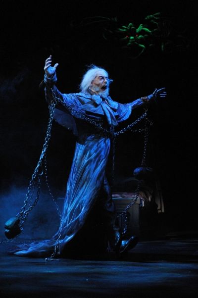 The Ghost of Jacob Marley (actor Lynn Robert Berg) warns Ebenezer Scrooge to change h Photo