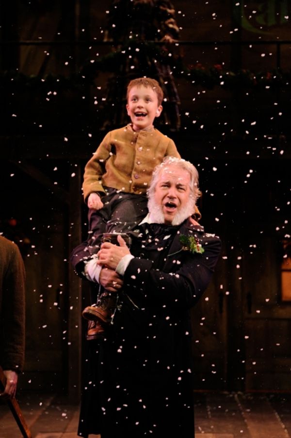 Fred Sullivan, Jr. as Scrooge and Nicholas Maltais as Tiny Tim Photo