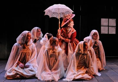 Angela Brazil as the Ghost of Christmas Present and the cast of A CHRISTMAS CAROL Photo