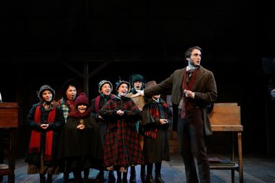 The children''s cast with Charlie Thurston as Bob Cratchit Photo