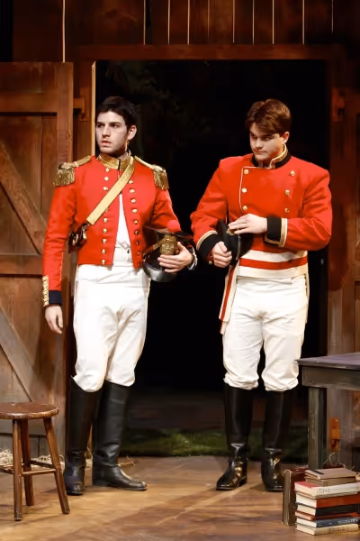 Moogie Brooks (Captain Lancey) and Derek Boyer Goh (Lt. Yolland) Photo