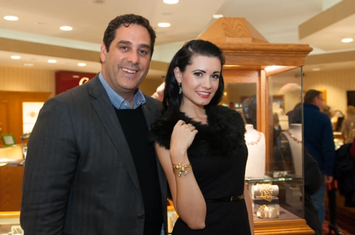 Moise Cohen, president of Marco Bicego, USA, with model Brittany Everitt at Designer Marco Bicego visits James Free Jewelers, Cincinnati