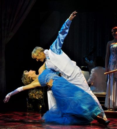 Co-hosts Deb Wims and Kenny Shepard perform their signature Christmas Waltz Photo