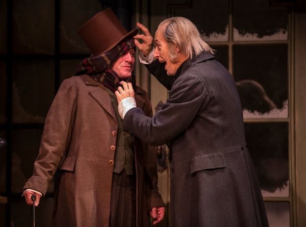 Ron Rains (Bob Cratchit) and Larry Yando (Scrooge)  Photo