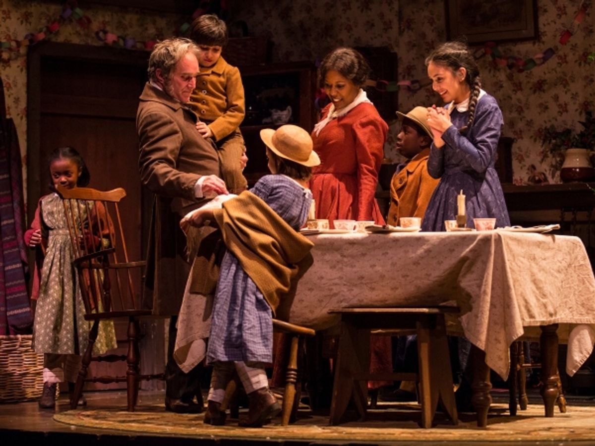 Mia Moore (Belinda Cratchit), Ron Rains (Bob Cratchit), Matthew Abraham (Tiny Tim), Francesca Mereu  (Emily Cratchit), Penelope Walker (Mrs. Cratchit), Brynden Cleveland (Peter Cratchit) and Haley Bolithon (Martha Cratchit) at 