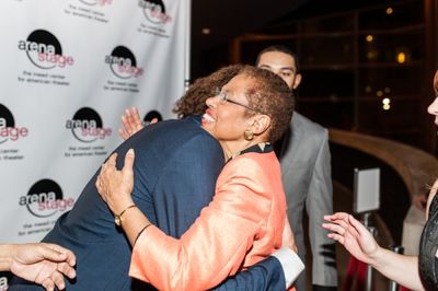 Leo Manzari embraces Congresswoman Eleanor Holmes Norton  Photo