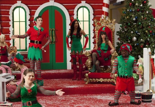 Kurt (Chris Colfer), Santana (Naya Rivera) and Rachel (Lea Michele) work as Santa''s  Photo