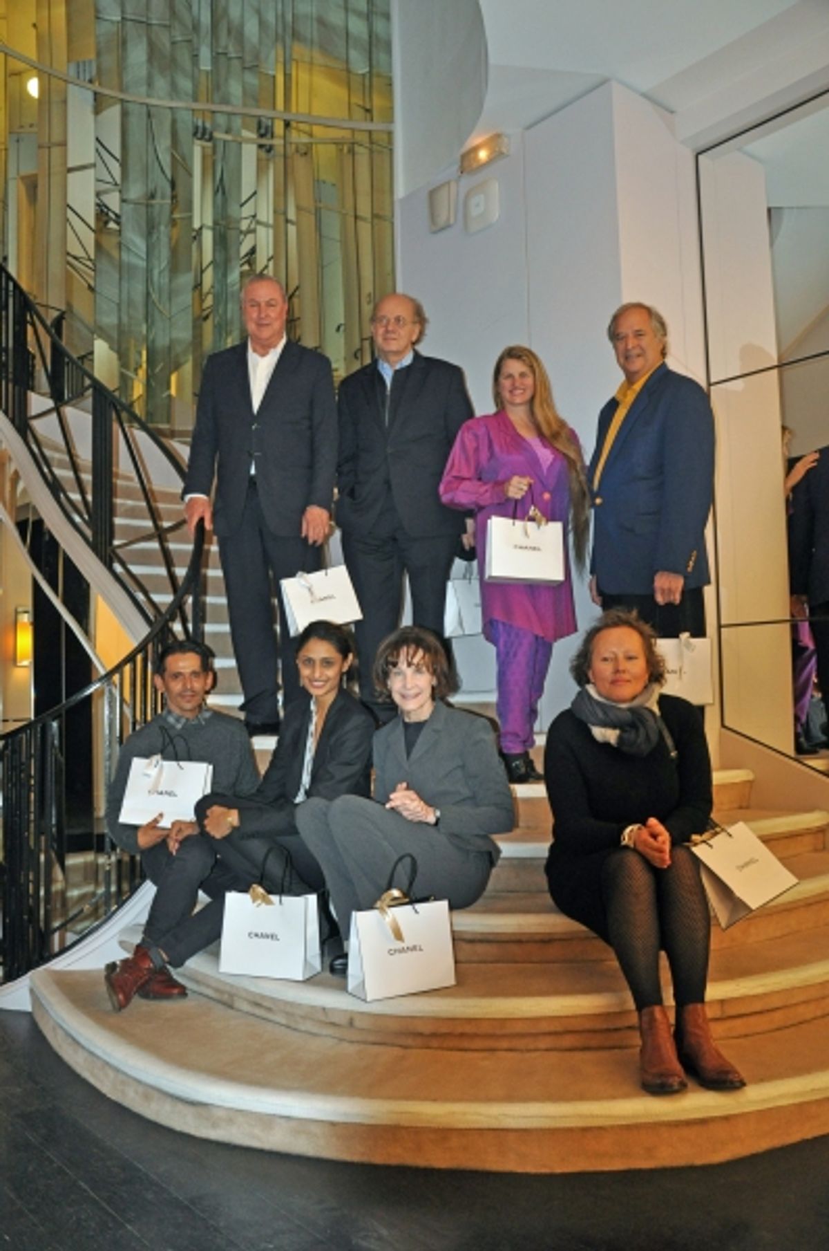 back row: Robert Wilson, Sacha Goldman, Bonnie Comley, Stewart F. Lane  front row: Nixon Beltran, Pinki Patell, Nina Zilkha, Karolina Blaberg in Coco Chanel''s private apartment at 