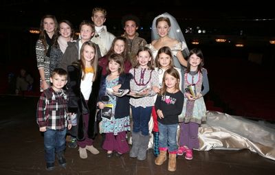 Laura Osnes and Santino Fontana pose with The ''Duck Dynasty'' Robertson Family Photo