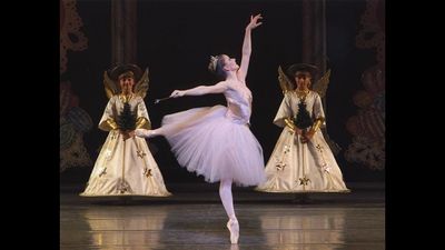 Abi Stafford as The Sugarplum Fairy with students from the School of American Ballet Photo