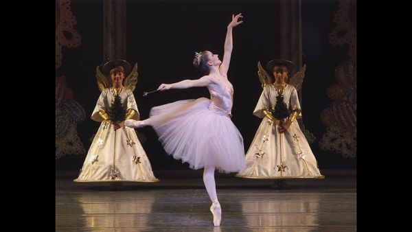 Abi Stafford as The Sugarplum Fairy with students from the School of American Ballet Photo