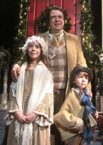 Real-life father of 11-year-old Sofia Murrell (Belinda Cratchit), left, and 6-year-ol Photo