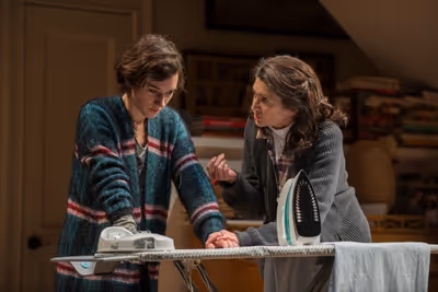 Beth (ensemble member Molly Regan) gives words of encouragement to her daughter, Ruth Photo
