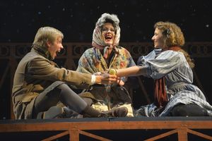 Kai (Tim Homsley),Grandmother (Lee Ann Payne) and Gerda (Eryn Murman) play games in San Jose Rep’s world premiere musical adaptation of The Snow Queen. @ BroadwayWorld Kai (Tim Homsley),Grandmother (Lee Ann Payne) and Gerda (Eryn Murman) play games in S Photo